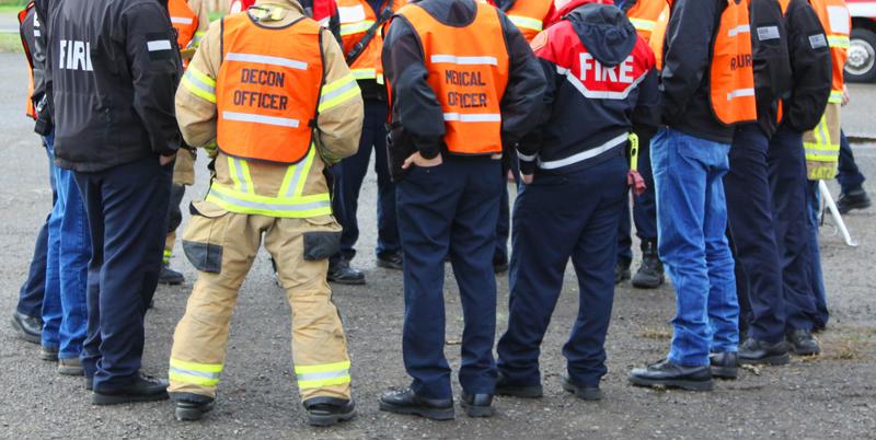 Emergency response team talking in a circle.
