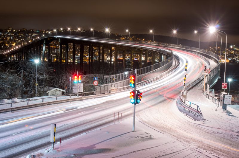 Snowy road at night