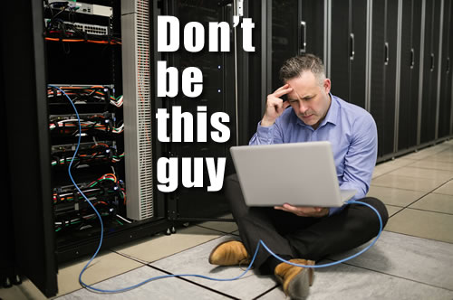 Don't be this guy! Frustrated technician in a data center